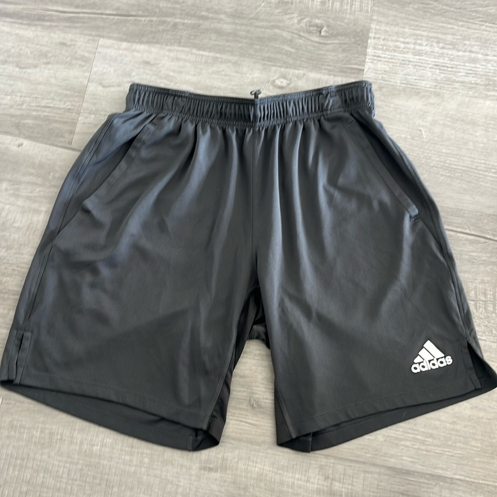 Adidas: Dark gray nylon drawstring shorts with pockets. Like new.